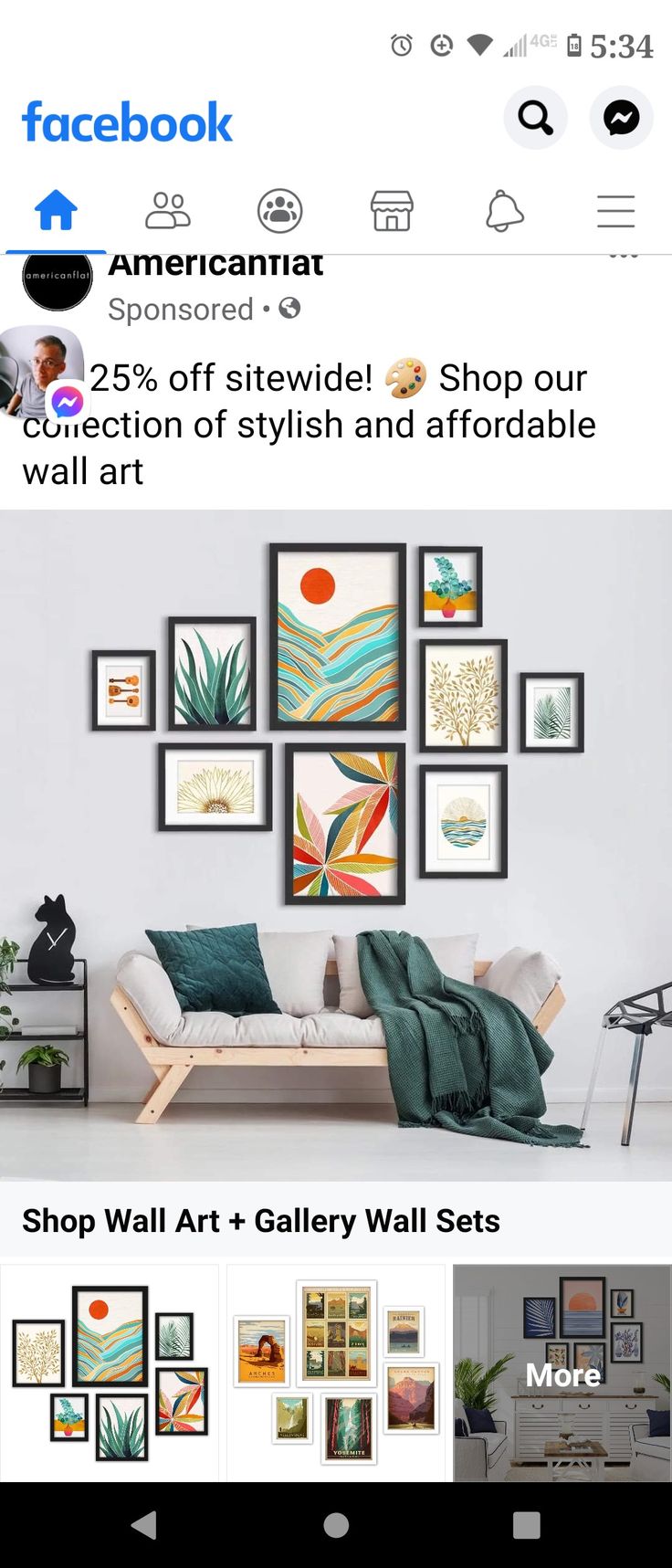 an image of a living room with pictures on the wall and in front of it