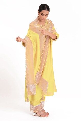 Pastel yellow kurta with embroidered banarasi jacquard tissue yoke. Paired with a slub silk pant and chanderi dupatta with scalloped tissue detailing. - Aza Fashions Yellow Palazzo Set For Diwali, Yellow Sharara With Straight Kurta, Yellow Silk Sets With Gota Work, Yellow Silk Kurta For Eid, Yellow Chanderi Palazzo Set With Sheer Dupatta, Bollywood Style Yellow Silk Kurta, Yellow Silk Salwar Kameez With Chikankari Embroidery, Yellow Silk Salwar Kameez With Gota Work, Yellow Silk Sharara With Dabka Details