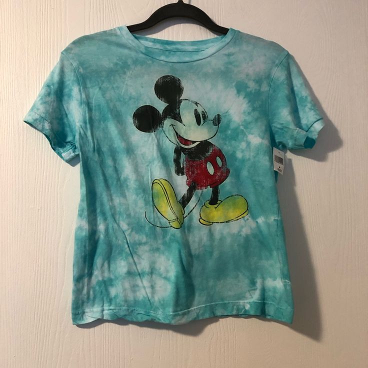 Blue Tie-Dye Mickey Mouse Tee. Authentic Disney Parks And Brand New With Tags. Casual Blue Shirt With Character Print, Blue Mickey Mouse Playful T-shirt, Playful Blue Mickey Mouse T-shirt, Playful Blue Mickey Mouse Top, Blue Mickey Mouse Short Sleeve Tops, Casual Mickey Mouse T-shirt For Spring, Blue Short Sleeve Tops With Mickey Mouse, Blue Cotton Mickey Mouse T-shirt, Summer Mickey Mouse Crew Neck Shirt