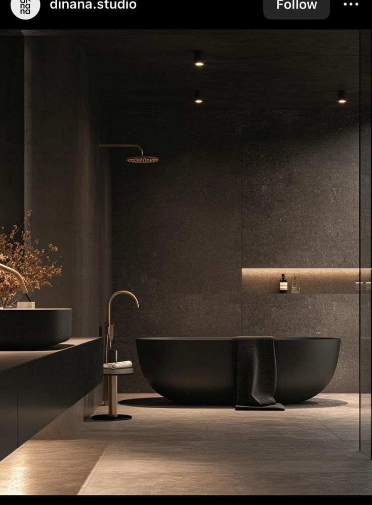 a bathroom with two sinks and a bathtub in the middle, surrounded by black walls