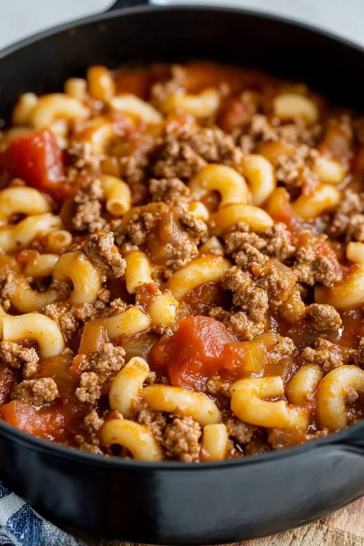 a skillet filled with macaroni and cheese