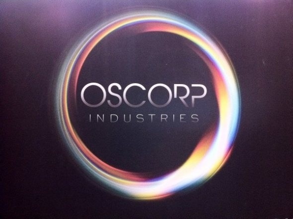 an image of the logo for oscar industriess on a dark background with light streaks