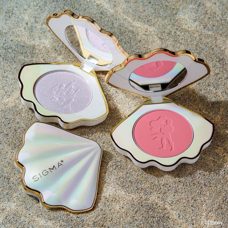 DISNEY THE LITTLE MERMAID HIGHLIGHTER Sea the magic with this light-reflecting pressed powder highlighter. The long-wearing formula easily blends into your skin to create a radiant, high-impact glow. Available only to U.S. and Canada. Not eligible for any discounts. ©Disney DETAILS Shade Available:Seashell - Soft pearlescent metallic Dimensions per product: W/o packaging: 70mm x 15mm x 59mmWith packaging: 60mm x 17mm x 60mm Net: 0.14oz/4gGross: 40g HOW TO USE Using your favorite highlighter brus Cute Makeup To Buy, Cool Makeup Products, Cute Makeup Packaging, Which Makeup, New Makeup Products, Little Mermaid Wedding, Cute Blush, Mermaid Stuff, Disney The Little Mermaid