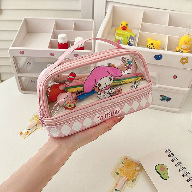 Cartoon Funny Large Pencil Case This adorable Cartoon Funny Large Pencil Case is perfect for storing all your writing utensils. With a playful cartoon design, it adds a touch of cuteness to your supplies. Its spacious interior can hold all your pencils, pens, and more, making it a functional yet fun accessory for your school or office needs. Cartoon Hello Kitty, Large Pencil Case, Sanrio Cartoon, Efficient Storage, Pen Bag, Writing Utensils, Cartoon Funny, Stationery Organization, Pens Pencils