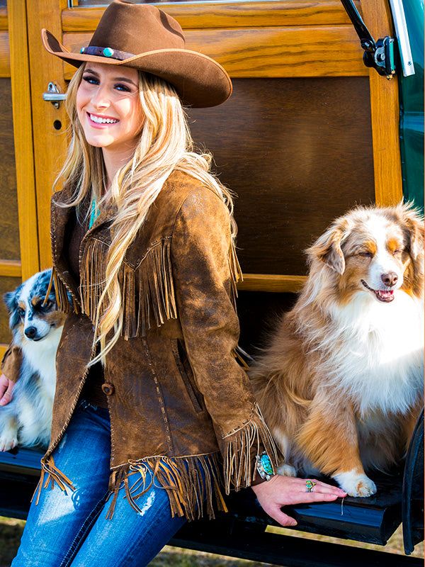 Great pricing on this beautiful coat, originally $1898. The perfect jacket and perfect finish to any western outfit. Our Jessie Fringe Jacket was created with careful placement of fringe and pockets. Loaded with hand stitching, our Italian leather has and amazing attention to detail. Fun to wear, and a true Wild West Statement! Fine distressed Italian leather in camel, taupe and tan, and chocolate. We do stock inventory, but please allow 4 weeks, in case we are in production, contact if you are Rodeo Outerwear With Tassels, Western Style Brown Outerwear For Rodeo, Western Brown Outerwear For Rodeo, Western Brown Rodeo Outerwear, Brown Western Outerwear For Rodeo, Western Style Long Sleeve Outerwear For Western-themed Events, Fall Leather Jacket With Fringe For Rodeo, Leather Jacket With Fringe For Rodeo In Fall, Western Style Outerwear For Fall Ranch