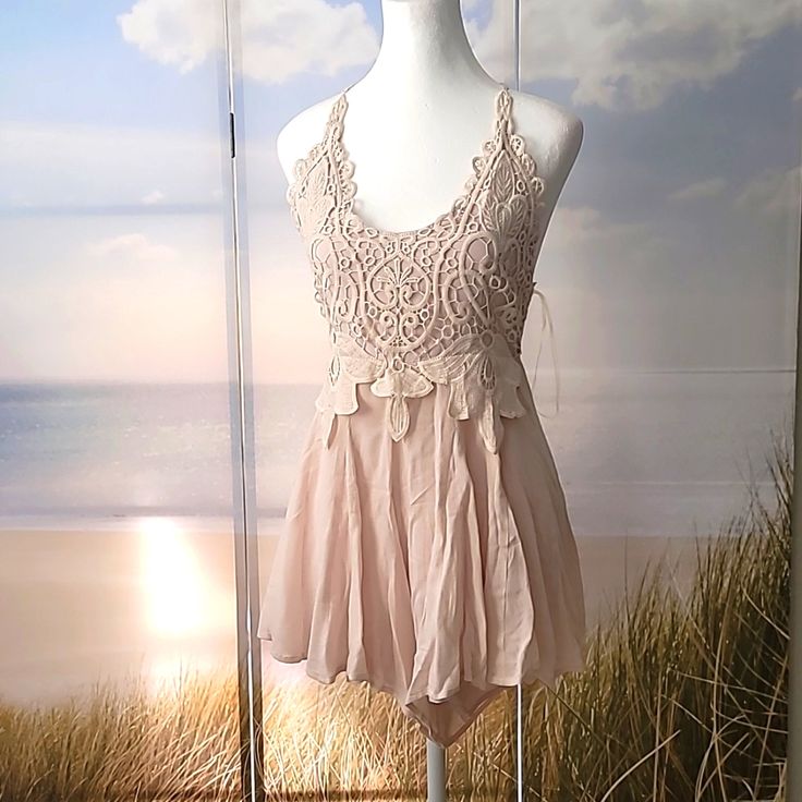 Unique Romper, Fully Lined, Brand New With Tag. 100% Cotton, Zipper And Tie In The Back. Size L But It Runs Small. Seems More Like A Medium To Me. Tried To Post Measurements In The Pictures But It's Very Adjustable Due To The Type Of Straps And How They Tie In The Back. Feminine Lace Crochet Top For Summer, Beige Feminine Lace Top For Summer, Feminine Lace Top For Summer Beach, Feminine Beige Lace Top For Summer, Fitted Lace Crop Top For Summer, Beige Lace Top For Summer Day Out, Fitted Lace Top For Summer, Fitted Lace Top For Summer Beach, Summer Beach Lace Top Fitted