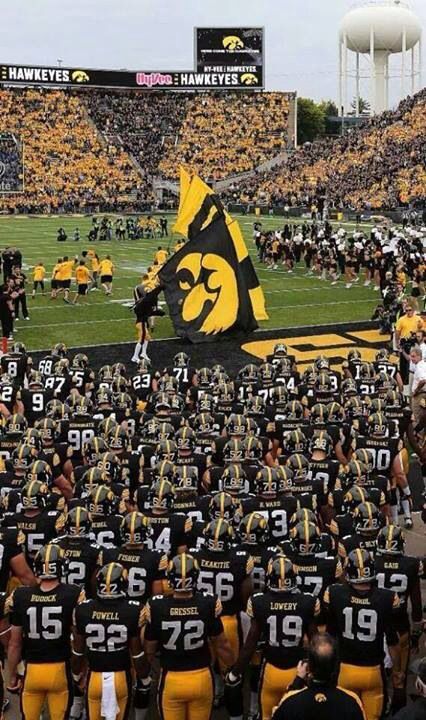 the football team is lined up on the field