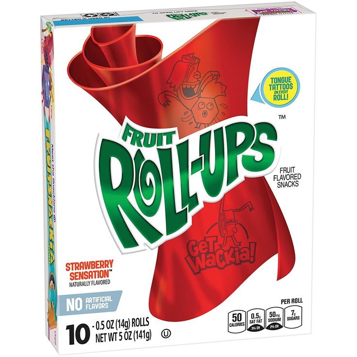 a box of fruit rolls sitting on top of a white table next to a red flag