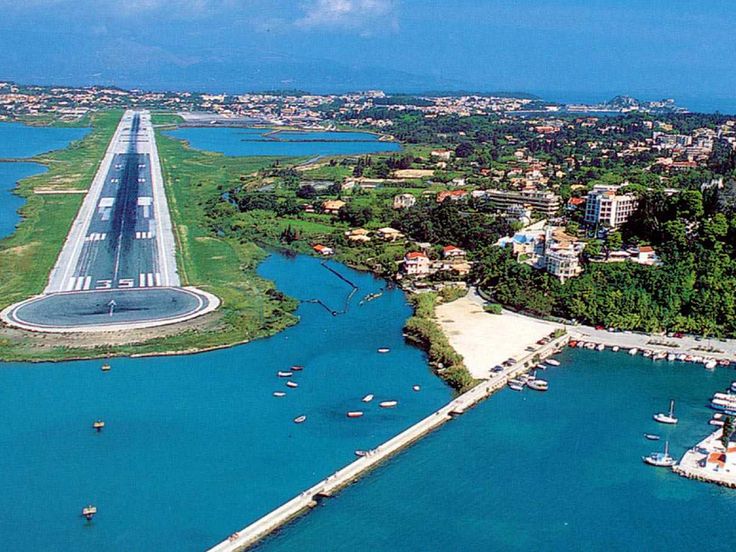 an aerial view of a bridge over the water