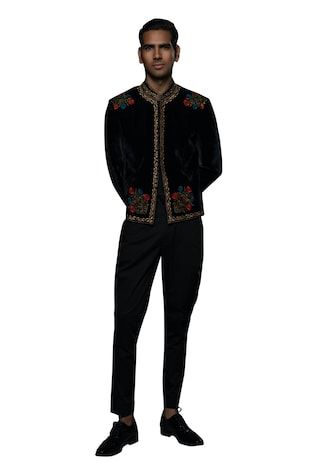 Black velvet jacket featuring zardozi embroidered vine motifs on border, embellished by beads and resham embroidered floral motifs. - Aza Fashions Designer Ceremonial Outerwear For Festive Occasions, Designer Festive Ceremonial Outerwear, Designer Festive Outerwear For Ceremonial Occasion, Fitted Festive Outerwear With Embroidered Sleeves, Ceremonial Winter Outerwear With Zari Work, Traditional Embellished Festive Outerwear, Embroidered Nehru Jacket For Winter Reception, Traditional Fitted Outerwear With Embroidered Sleeves, Designer Ceremonial Winter Outerwear