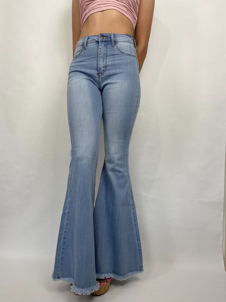 Bia Bell Bottom Jeans Jeans are true to size! Oversized (extremely long) Size runs small Wide leg Back pockets Stretchy Unfinished hem High waisted Belt loops on waist Model is 5'7 wearing a size 7 Fabric: 60%Cotton, 32%Modal, 7%T400, 1%Lycra Bell Jeans, Country Things, Oversized Jeans, Bottom Jeans, Bell Bottom, Sweater Set, Blazer Dress, Jean Outfits, Denim Women