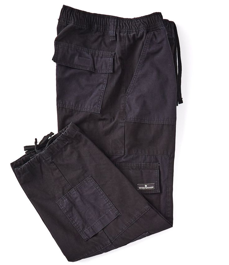 From BDG Urban Outfitters, these pants feature:rigid denim fabricrelaxed fitstraight legsflat front stylingzippered fly with button closurebelt loopsmultiple pockets on the front, sides and backcottonMachine wash; tumble dryImported. Cotton Bottoms With Hip Pockets In Dark Wash, Utility Style Dark Wash Cotton Bottoms, Dark Wash Cotton Bottoms With Hip Pockets, Urban Style Dark Wash Pants With Side Pockets, Dark Wash Bottoms With Tapered Leg And Side Pockets, Dark Wash Tapered Leg Bottoms With Side Pockets, Utility Dark Wash Pants With Side Pockets, Utility Cotton Bottoms In Dark Wash, Dark Wash Cargo Style Bottoms For Work