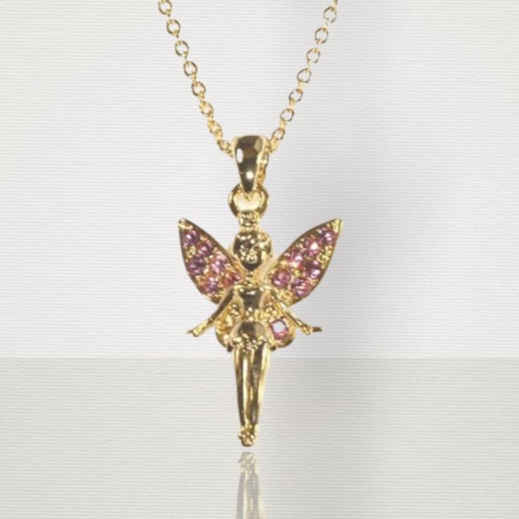 This fairy princess gold necklace is beautifully crafted with pink jewels on the wings. A fabulous gift idea. Gold chain. Suitable for children age 3 and over. Chain length 71/2 in. Baby Bible, Earth Baby, Pink Jewels, Fairy Necklace, Fairy Princess, Fairy Princesses, The Wings, Mini Wallet