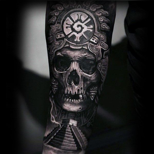 a man's arm with a skull and clock tattoo on it