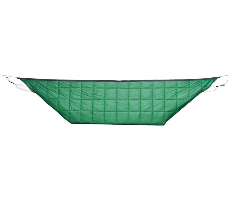 a green tarp hanging from the side of a white wall