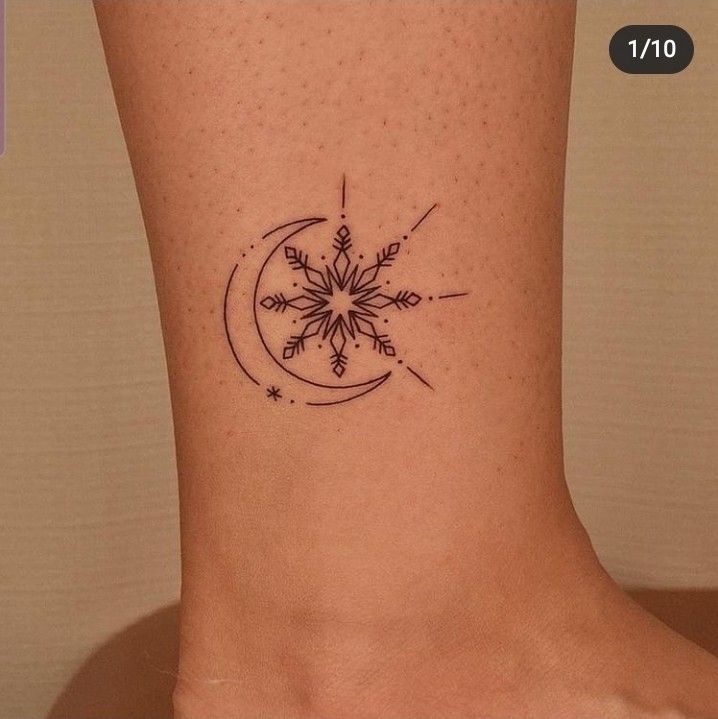 a small snowflake tattoo on the ankle