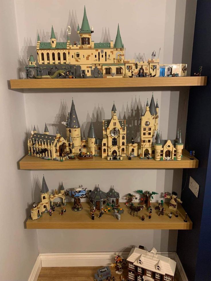 some shelves filled with legos and buildings