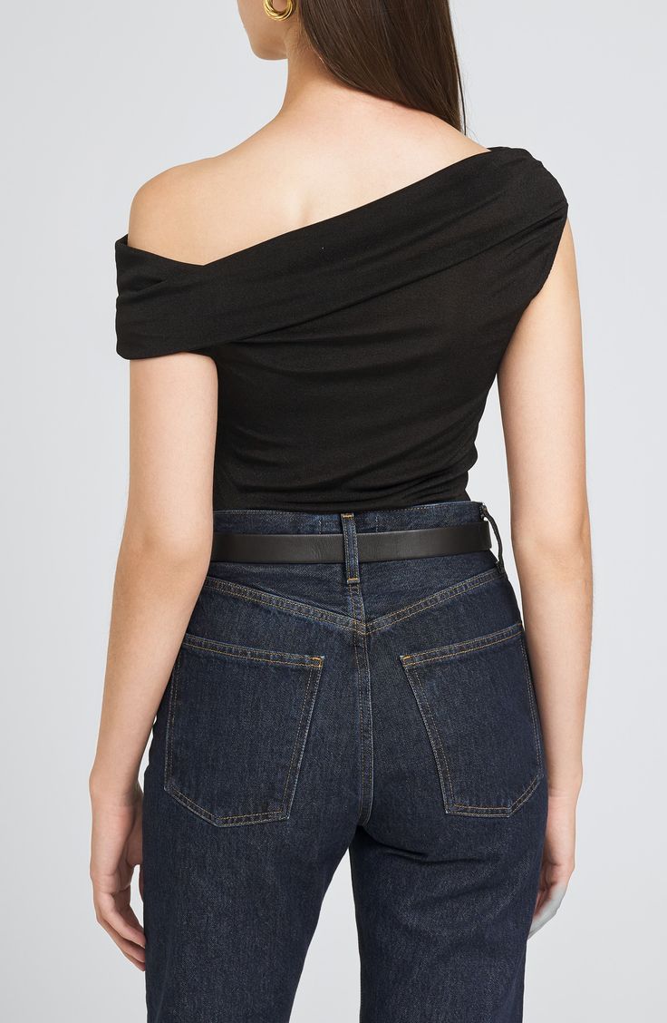 Designed in a sweet shoulder-baring silhouette, this stretchy and versatile jersey bodysuit is the perfect piece to start off your next OOTD. Snap closure One-shoulder neck Short sleeves 95% polyester, 5% elastane Hand wash, dry flat Imported Black Off-shoulder One Shoulder Top, Stretch Off-shoulder Bodysuit For Evening, Off-shoulder Bodysuit For Night Out, Off-shoulder Fitted Bodysuit For Night Out, Stretch Off-shoulder Evening Bodysuit, Stretch One-shoulder Bodysuit, Trendy Stretch One-shoulder Bodysuit, Chic Stretch Off-shoulder Bodysuit, Black Stretch One-shoulder Bodysuit