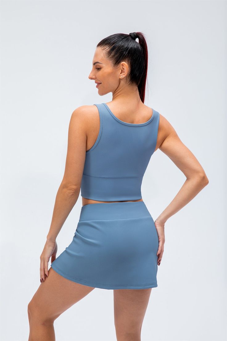 74% Nylon. 26% Spandex 4-way stretch. breathable and sweat-wicking High waisted design Crisp and stylish Wear resistant Liner shorts with side pockets 2-in-1: Built-in shorts for comfort & protection (shorts are not separate) Perfect for both sports activities and daily life Athleisure Skort With Built-in Shorts For Yoga, High Stretch Athleisure Skort With Built-in Shorts, Stretch Tennis Skirt With Built-in Shorts For Gym, 4-way Stretch Tennis Skirt With Built-in Shorts For Workout, Sporty Blue Skort With Built-in Shorts, 4-way Stretch Workout Skort With Built-in Shorts, Workout Skort With Built-in Shorts And 4-way Stretch, Workout Skort With 4-way Stretch And Built-in Shorts, Workout Skort With Built-in 4-way Stretch Shorts