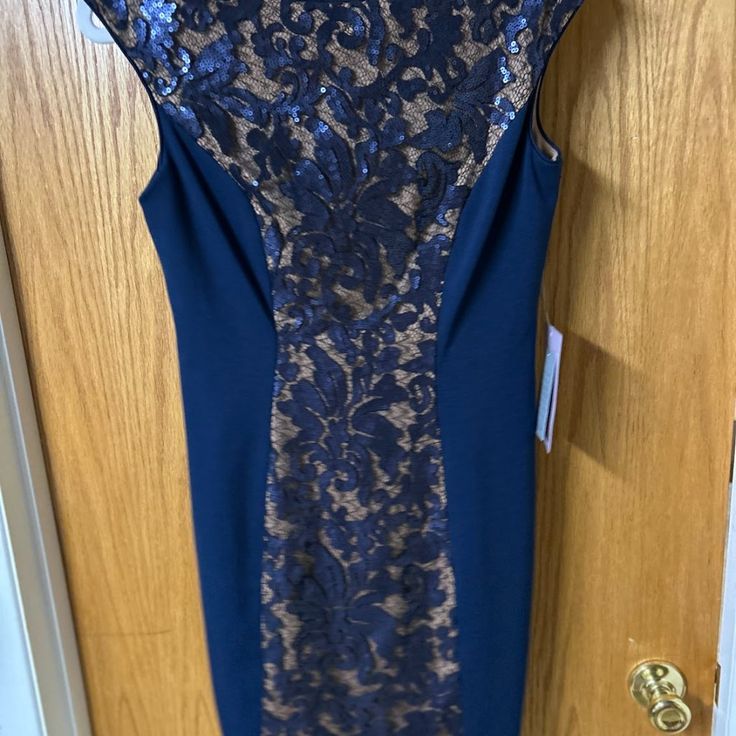 This 6p Navy Blue And Gold Sequin Dress Is Great For Any Wedding Guest! High Neck, V-Style Back. Formal Royal Blue Lace Dresses, Blue Lace Mother Of The Bride Dress For Party, Blue Fitted Evening Dress For Wedding Guest, Blue Lace Evening Dress For Formal Occasions, Royal Blue Lace Elegant Dress, Formal Blue Lace Evening Dress, Elegant Royal Blue Lace Dress, Royal Blue Fitted Formal Mother Of The Bride Dress, Blue Lace Fitted Mother Of The Bride Dress