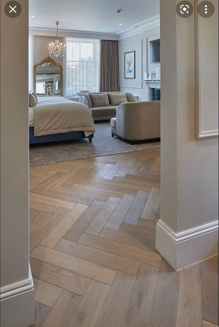 an open door leading to a living room and bedroom