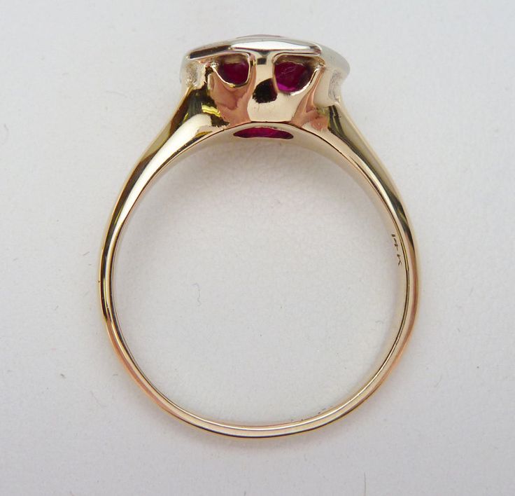 This is a very old and classic birthstone ring. This ring has a European cut round synthetic red stone in the center (most likely synthetic spinel but I don't have a way to test it) that measures 8.5 mm. The stone is set in a hexagonal white gold plate that is welded to a yellow gold shank. The ring is stamped 14K and weighs 3.6 grams. The ring is a size 6. This is such a classic item and it's in very good condition. The ring has been polished up a bit and looks almost new. Red Stone, Birthstone Ring, Solitaire Ring, Birthstone, Cocoa, Gold Plate, White Gold, Yellow Gold, Size 6