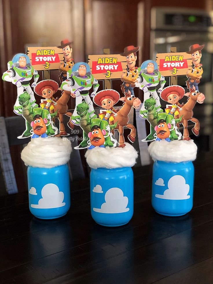 toy story birthday party favors in blue jars