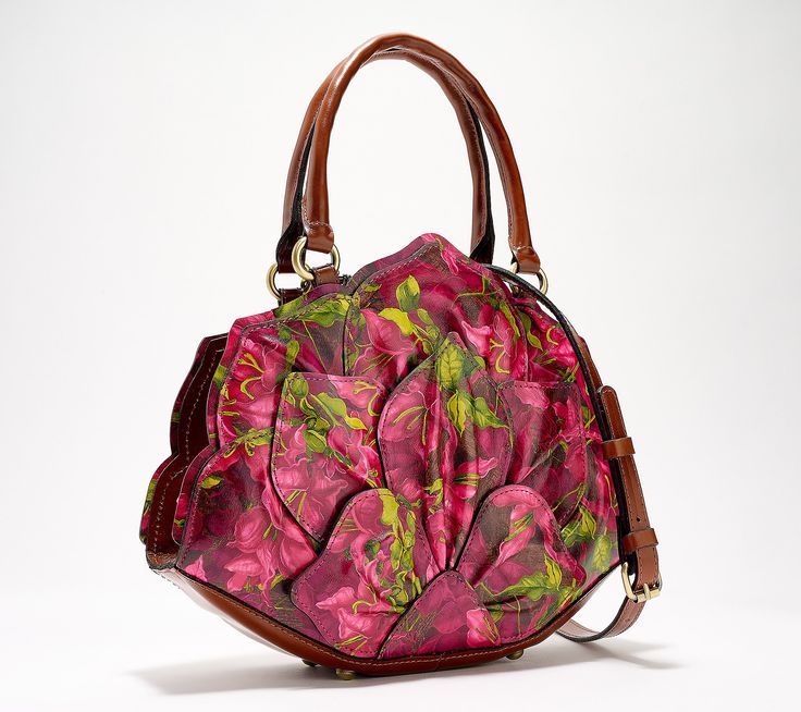 The bloom is on the bag! This petaled leather satchel is a pretty, playful pick for sophisticated luncheons, outdoor weddings, and wine country destinations. From Patricia Nash. Elegant Floral Print Shoulder Bag For Spring, Leather Top Handle Bag With Floral Print, Elegant Floral Print Shopping Bag, Floral Print Formal Bags For Spring, Formal Floral Print Bags For Spring, Formal Floral Print Bag For Spring, Formal Spring Floral Print Bags, Elegant Leather Shoulder Bag With Floral Print, Elegant Floral Print Shoulder Bag For Shopping