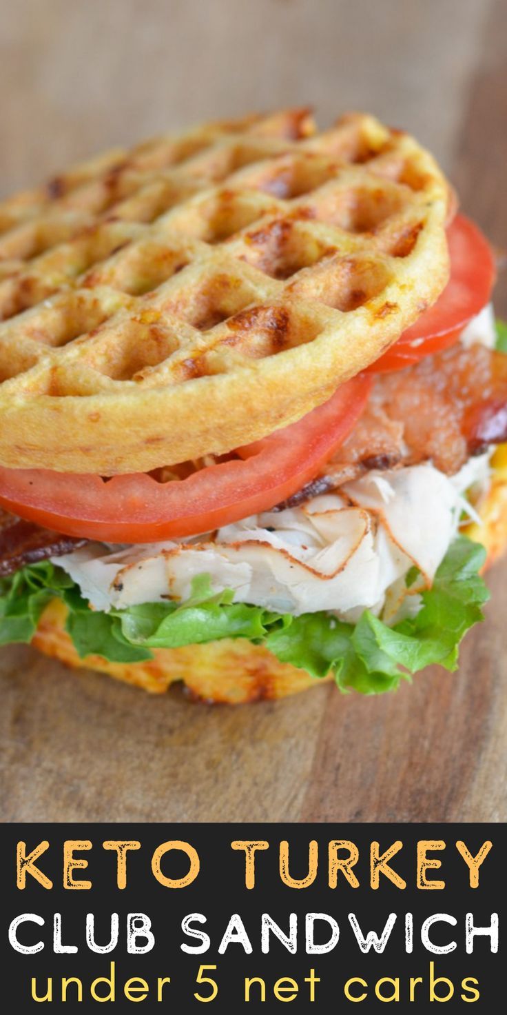 a waffle sandwich with lettuce and tomato on it