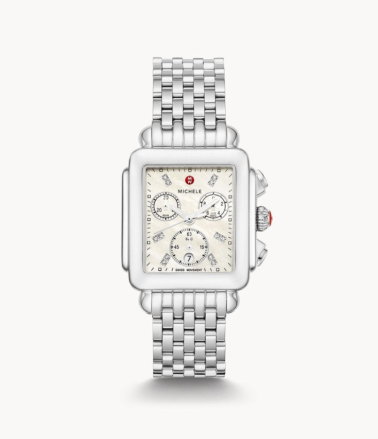 The rectangular case of the Deco stainless diamond dial watch reflects the geometric shapes identified with Art Deco architecture. This iconic Swiss chronograph timepiece features 12 brilliant diamonds atop the mother-of-pearl dial, three subeyes accented with gold foil and engraved MICHELE logos within the case walls. A stainless seven-link bracelet adds the finishing touch and is interchangeable with any 18mm MICHELE strap. Western Cowgirl Outfits, Michele Deco Watch, Michele Watch, Michele Watches, Double Diamond, Art Deco Architecture, Beautiful Watches, Diamond Watch, Stainless Steel Watch