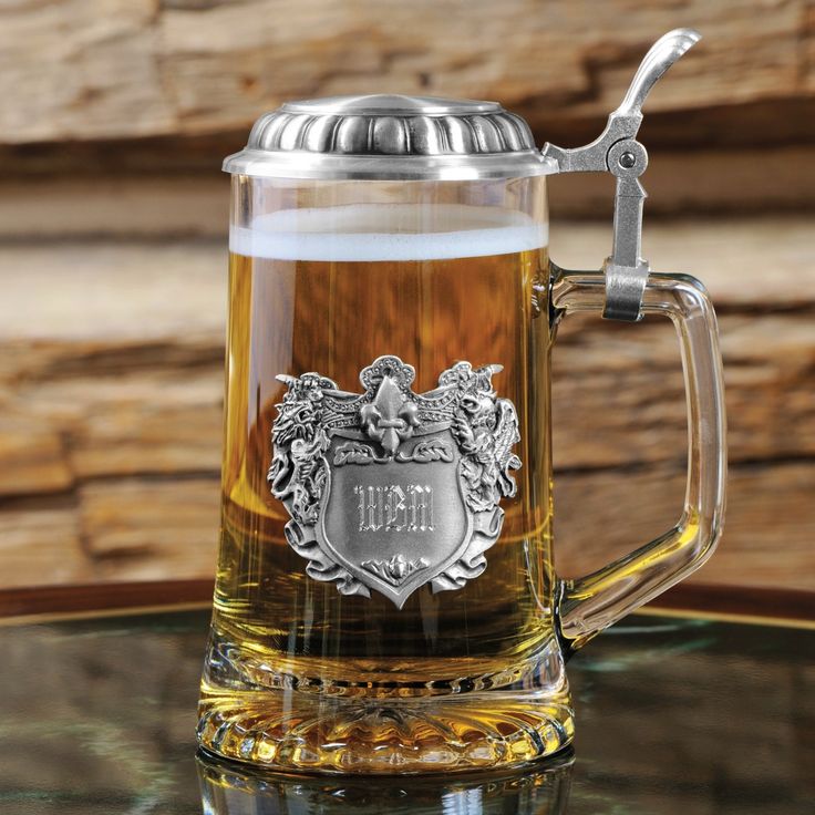 a beer mug with a handle on a table