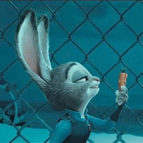 an animated rabbit holding a carrot behind a chain link fence