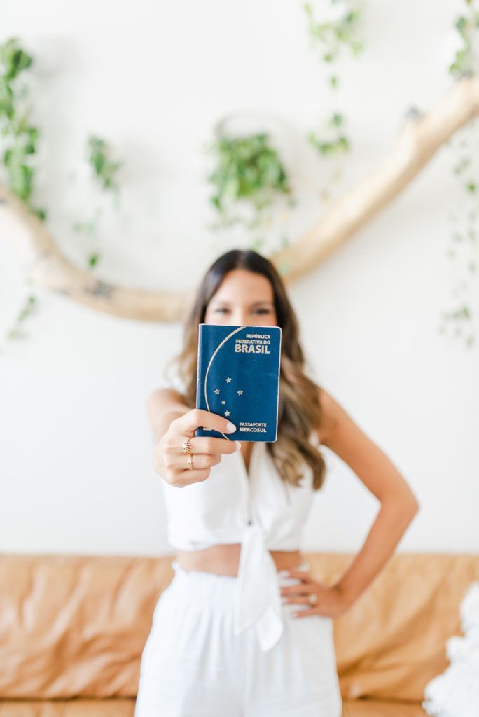 a woman holding up a book in front of her face