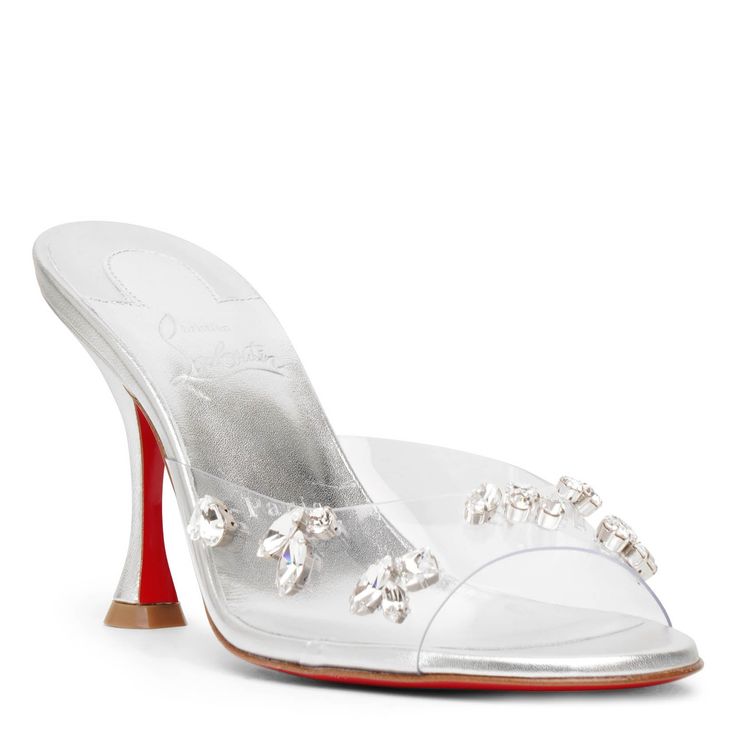 Silver pvc leather mules from Christian Louboutin. The Degraqueen mules are made of metallic nappa leather, set on an 85mm slanted heel. It features a transparent PVC upper, adorned with silver jewel-like strass.True to sizeSignature red leather soleMade in Italy Silver Heel, Red Lacquer, Silver Jewels, Leather Mules, Leather Care, Party Fashion, Nappa Leather, Luxury Handbags, Red Leather