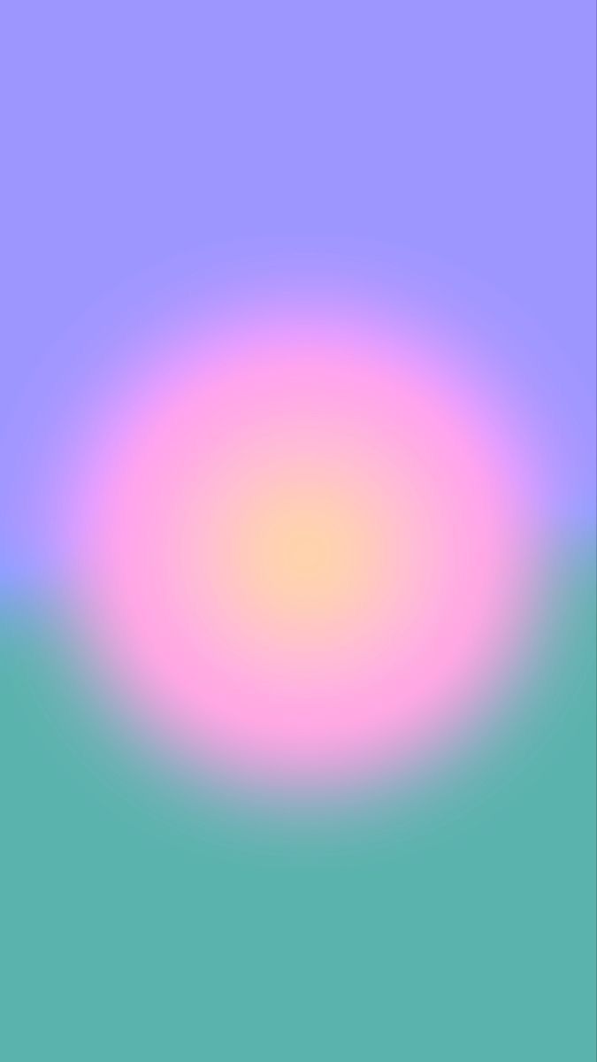 a blurry image of an orange and pink circle on a blue background with light