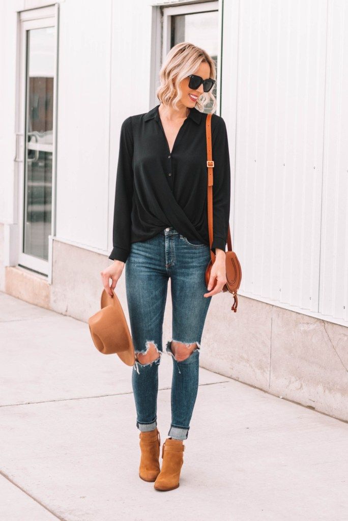 black blouse with tan booties and bag for fall