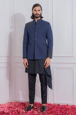 Navy blue bandhgala in suiting fabric with hand embroidery on shoulder and sleeves. Comes with a black asymmetrical suiting kurta and trouser. Blue Bandhgala, Bandhgala For Men, Mens Indo Western, Indo Western Outfits, Suiting Fabric, Blue Hand, Suit Fabric, Indo Western, Full Sleeves