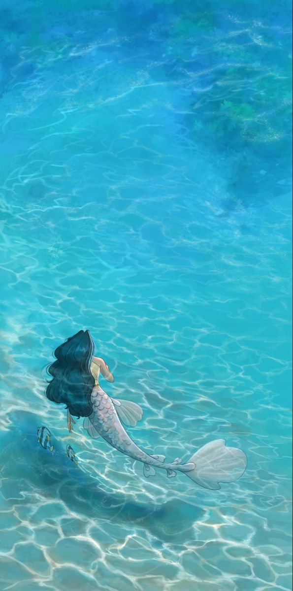 a mermaid is swimming in the blue water