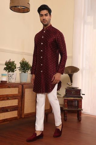 Wine full sleeve kurta with thread, sequin work and mandarin collared neckline. Paired with pant. - Aza Fashions Designer Long Sleeve Sets With Mirror Work, Festive Traditional Wear With Long Sleeves, Designer Bandhgala With Mirror Work And Long Sleeves, Designer Long Sleeve Bandhgala With Mirror Work, Festive Long Sleeve Sequin Kurta, Designer Sequined Kurta For Festive Occasions, Designer Long Sleeve Traditional Wear For Festive Season, Fitted Sequin Kurta With Traditional Drape, Long Sleeve Bandhgala With Mirror Work For Diwali