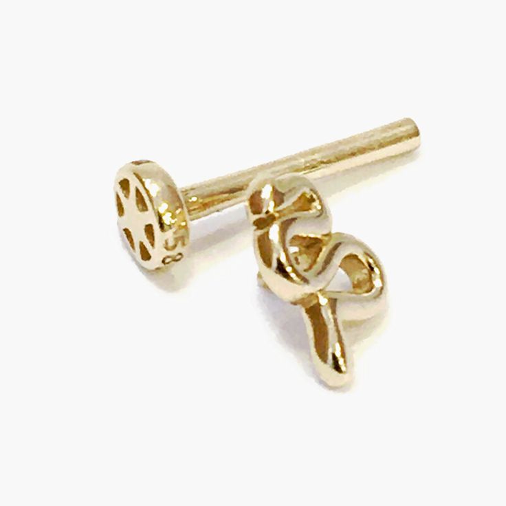 14K Solid Gold Helix or Tragus Piercing. Snake Earring, Cartilage Earring, 18G Cartilage Piercing. Helix Piercing is 8 mm, Tragus is 10 mm long., 14K Gold Helix, Screw Back Gold Helix. Tragus screw top, or front. Snake Helix or tragus., Helix Stud Earring, Cartilage Stud Piercing, Cartilage Earring. The thickness is 18 g(gauge: standard). Nickel-free Gold Cartilage Earrings Gift, Gold Cartilage Single Earring As A Gift, Gold Single Cartilage Earring As Gift, Gold Single Earring Cartilage Earrings As Gift, Tiny Elegant Gold Nose Rings, Tiny Gold Cartilage Earrings As Gift, Tiny Gold Cartilage Earrings For Gift, Nickel Free Yellow Gold Nose Rings For Gift, Gold Hypoallergenic Nose Rings For Anniversary