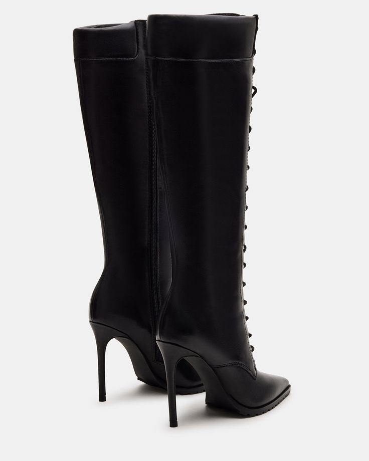 Elevate your style with our UTILITY boots. These boots showcase a sleek, sophisticated look with a knee-high design and pointed toe. The stiletto heel adds height and the lace-up design allows for a snug fit. These boots are perfect for any occasion. 4 inch heel height Size 6 measurements: 13.75 inch shaft circumference, 15 inch shaft height Size 8 measurements: 14.75 inch shaft circumference, 16 inch shaft height Size 10 measurements: 15.75 inch shaft circumference, 17 inch shaft height Leather Elegant Lace-up Platform Boots With Reinforced Heel, Chic Lace-up Boots With Pointed Toe For Party, Chic High Ankle Lace-up Boots For Evening, Elegant Lace-up Heeled Boots For Night Out, Elegant Fitted Lace-up Heeled Boots, Chic High-cut Boots For Night Out, Chic High Cut Boots For Night Out, Elegant Tall Boots For Party, Elegant Fitted Lace-up Platform Boots