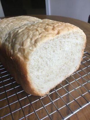 a loaf of bread sitting on top of a cooling rack