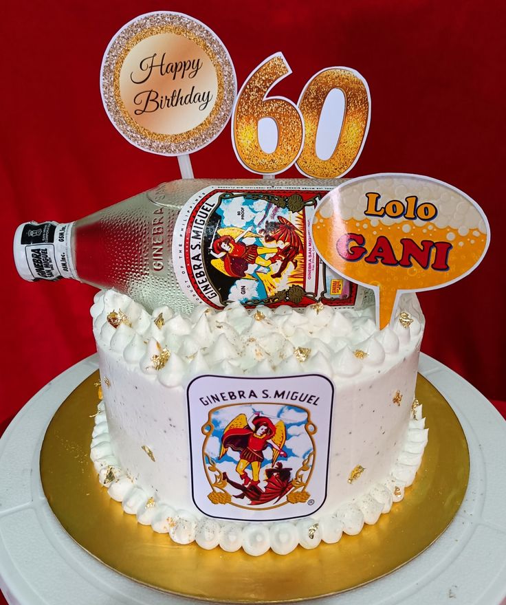 a birthday cake decorated with an image of mickey mouse and the number 60 on top