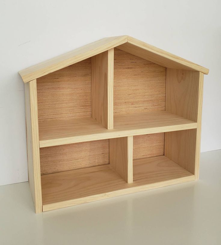 a wooden shelf with three shelves on each side