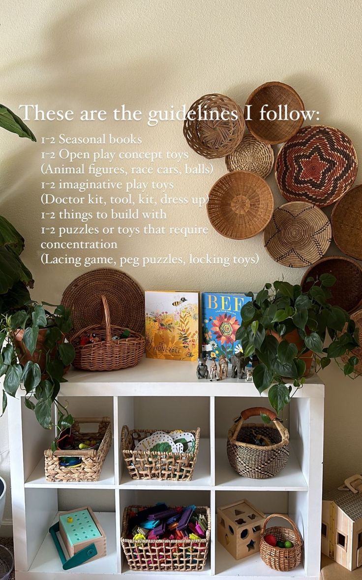 a shelf with baskets and books on it