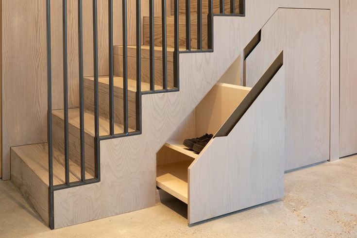 the stairs are made of wood and metal