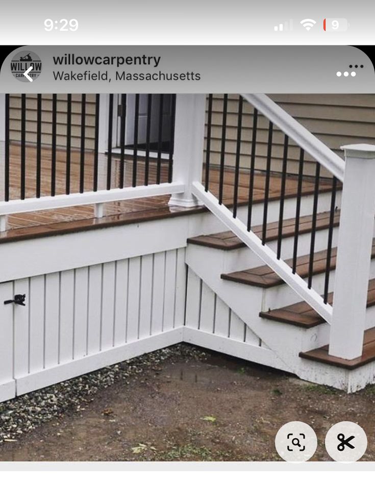 an image of a porch with stairs and railings