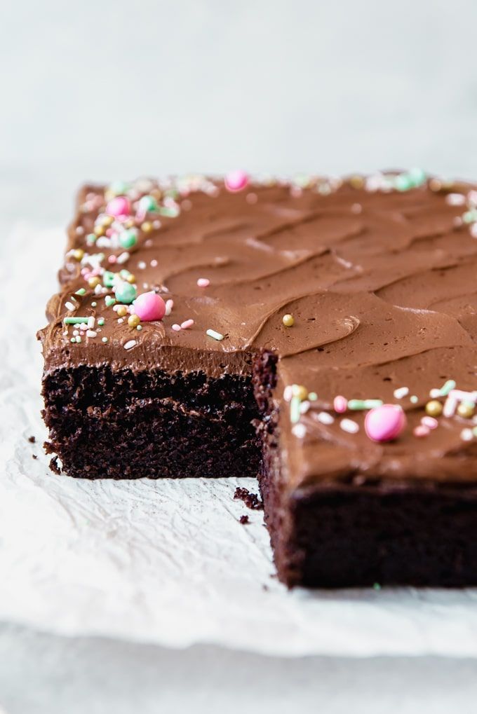 a piece of chocolate cake with sprinkles on it