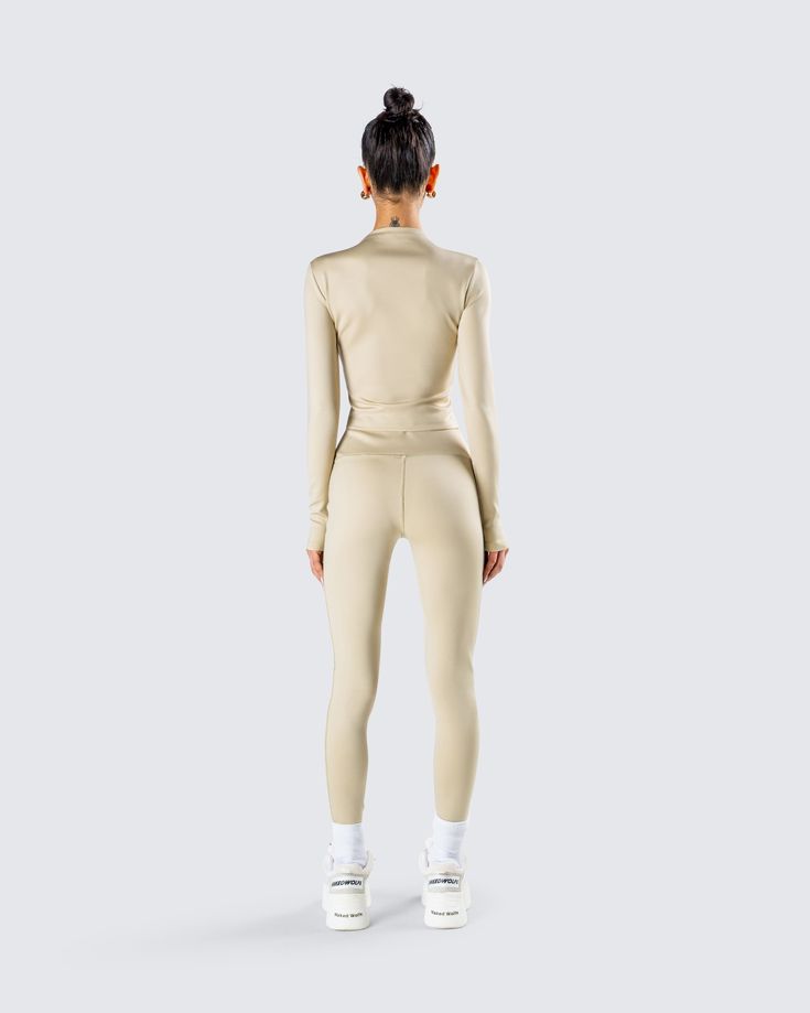 They’ll be tapping out trying to keep up with you in this fit 💅 Featuring a khaki compression stretch jersey long sleeve top, paired with compression stretch jersey leggings - this two-piece set will ensure your ready for any and all kinds of physical activity 😏 Fitted Beige Activewear For Pilates, Beige Fitted Activewear For Pilates, Fitted Beige Activewear, Beige Fitted Activewear Sportswear, Beige Fitted Sportswear Activewear, Beige Athleisure Activewear For Gym, Sporty Fitted Beige Activewear, Long Sleeve Tight Unitard With Thumbholes, Khaki Athleisure Activewear For Sports