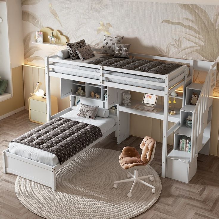 a white bunk bed sitting on top of a wooden floor next to a desk and chair